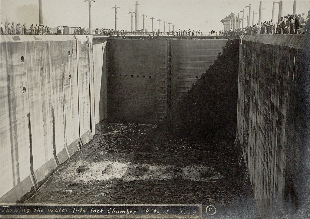 A Panama Canal lock chamber with water at its bottom